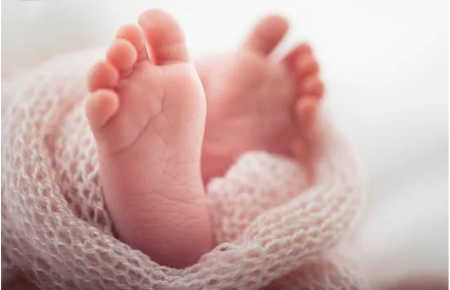 The soles of a baby's feet 